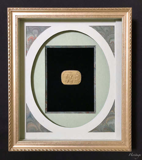 古代ローマのキューピッド・セラーのラーヴァ・カメオの額装イメージ